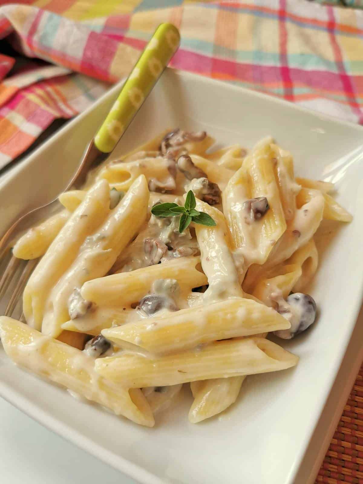 Lightweight and creamy gorgonzola paste with olive alla cenere.