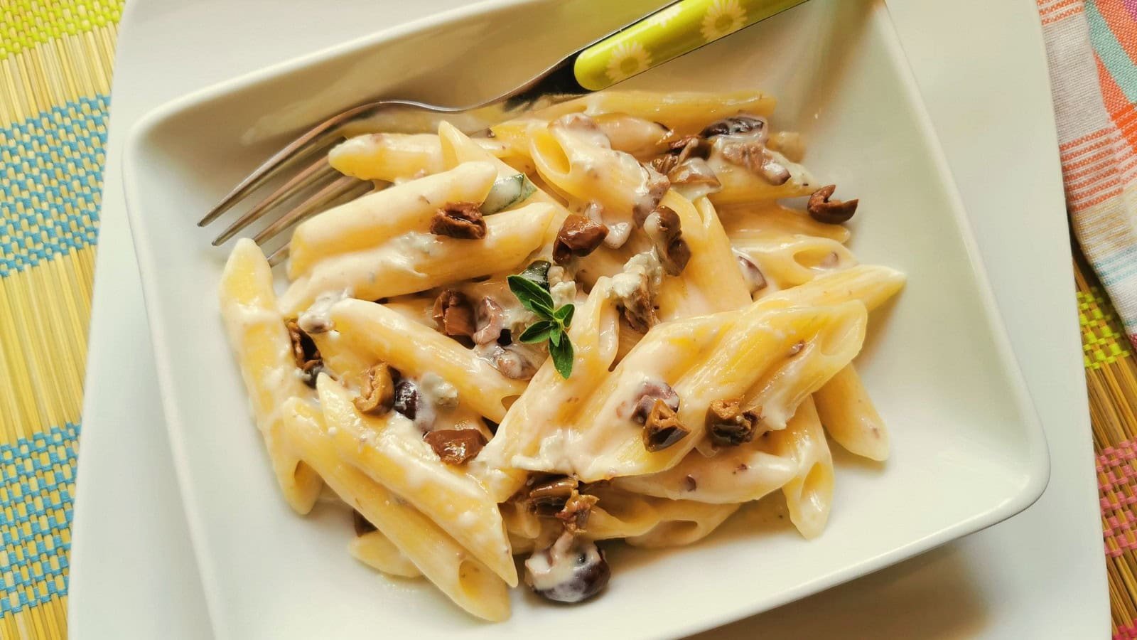 Creamy gorgonzola pasta with olives.