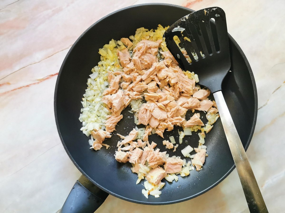 Sautèed onion and canned tuna in large frying pan.