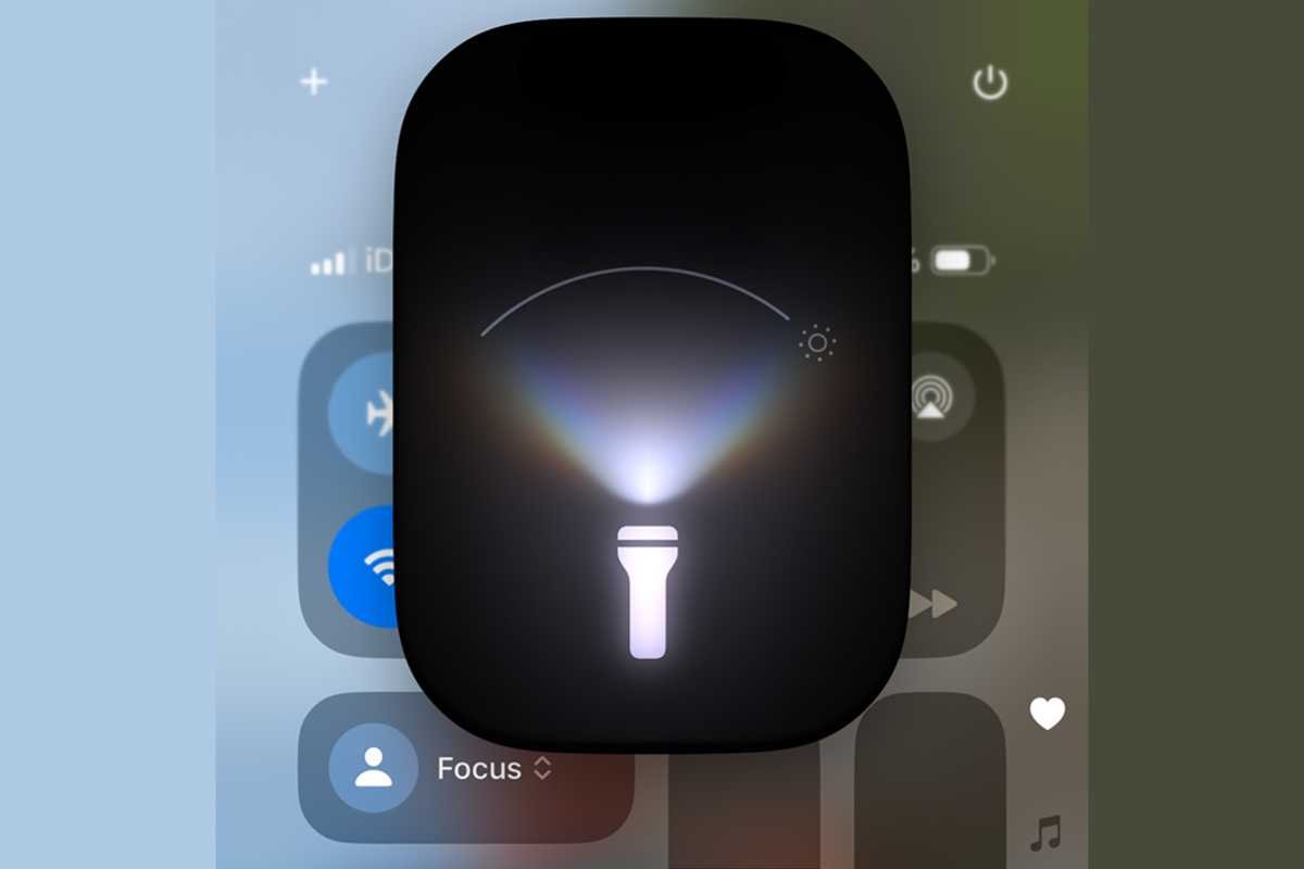 iPhone shows the flashlight with a wide beam