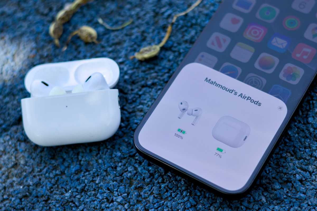 AirPods Pro 2 next to the iPhone 16 Pro Max