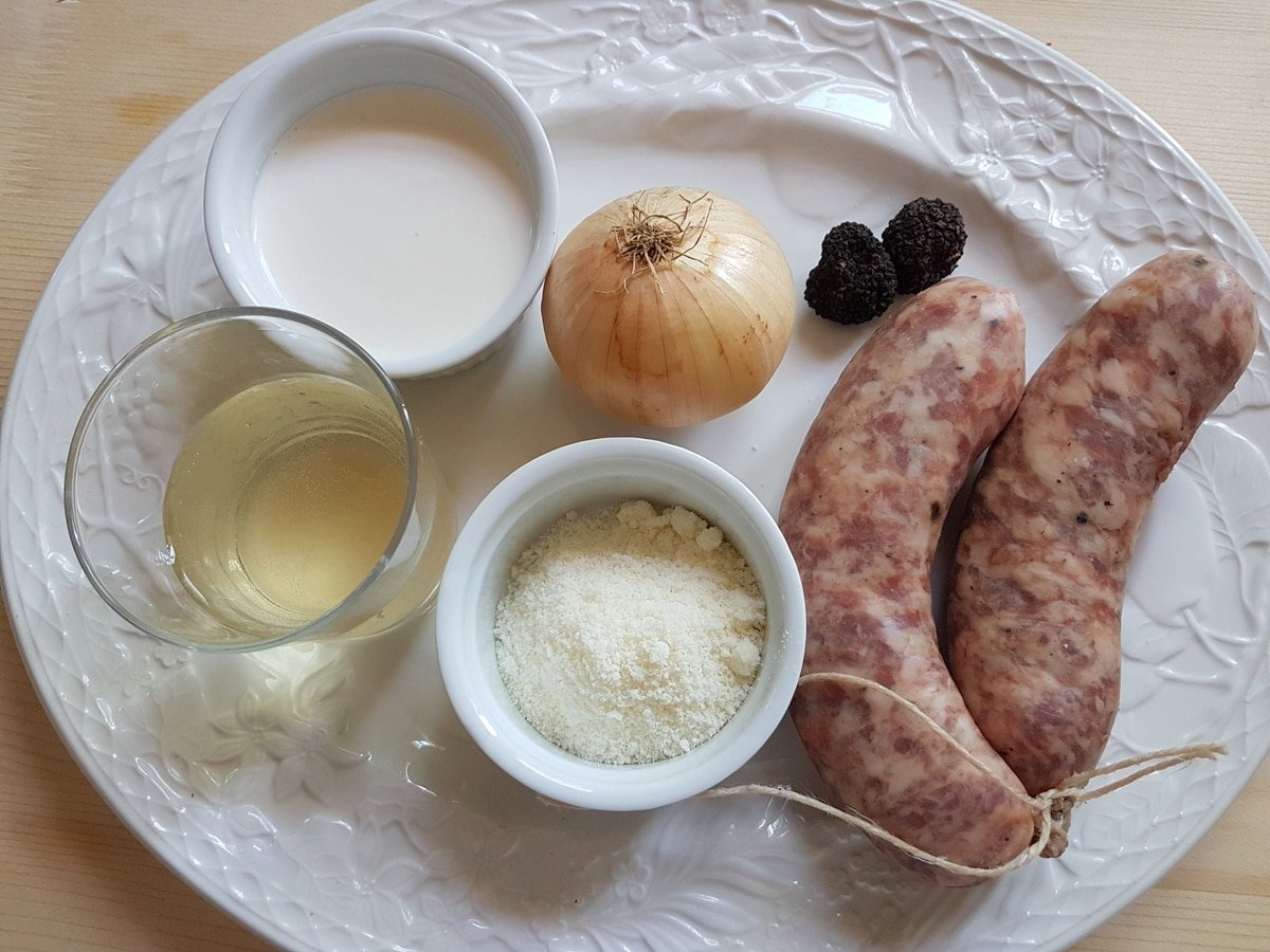 Ingredients for Pasta Norcina on a plate.