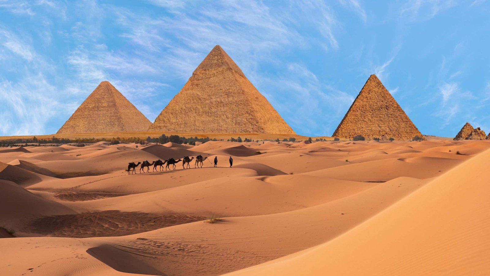 Caravan in front of the great pyramid in Giza, Egypt